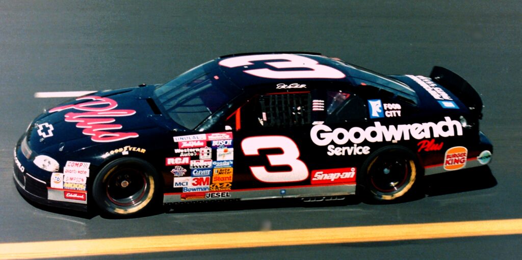 A Black chevy race car with the number 3 on the door. on asphalt  in Bristol Tennessee 